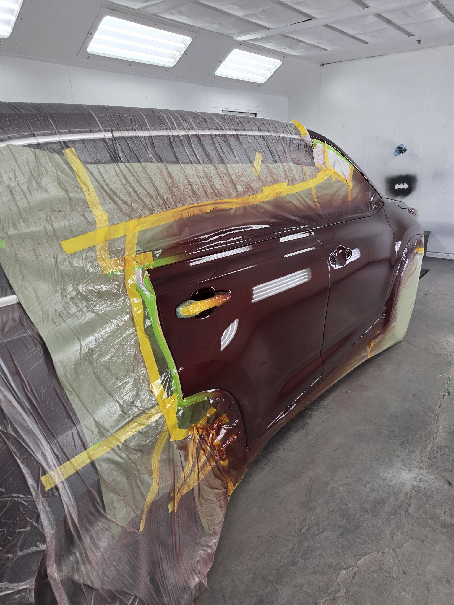 SUV inside the paint booth